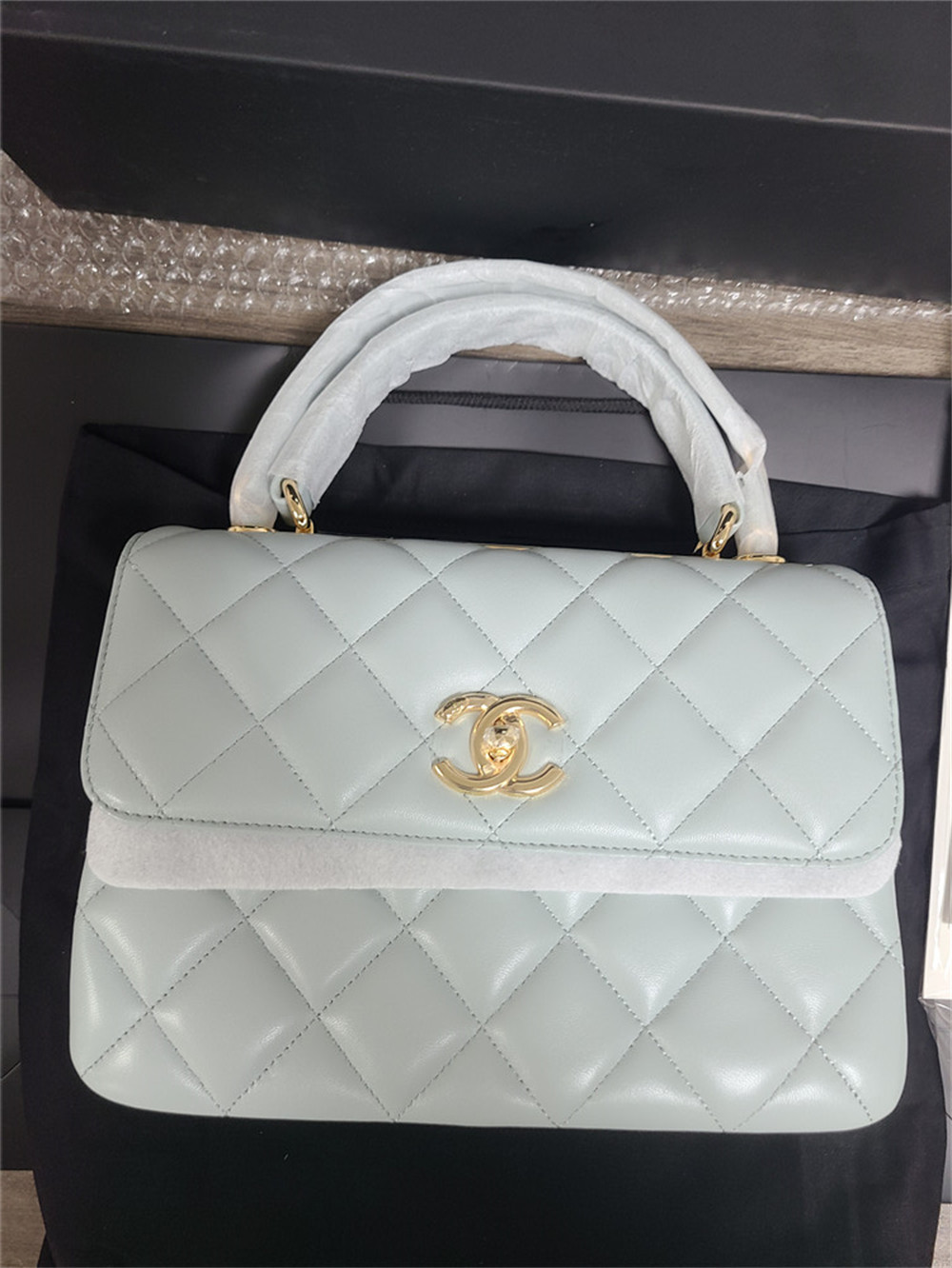 Ch*el flap bag with top handle 6.6 × 9.8 × 4.7 in