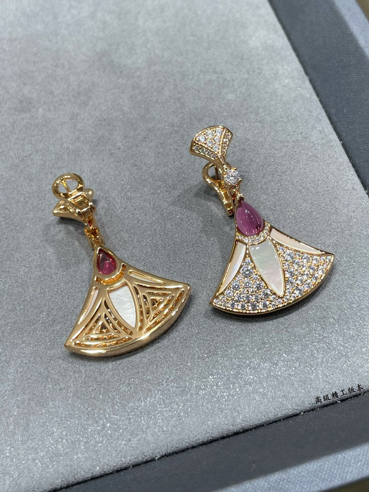 B*l*ai roman fan earrings