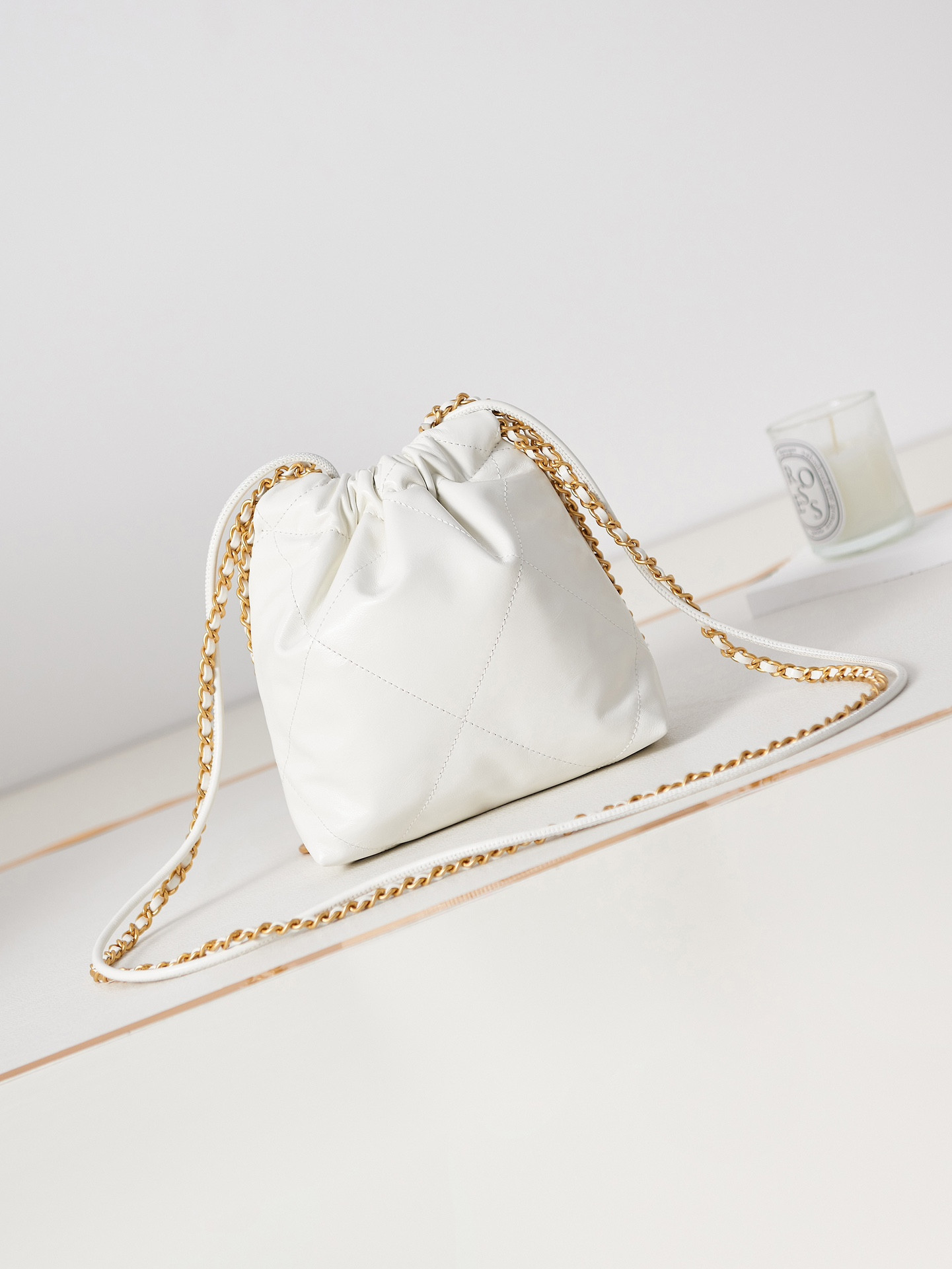 Ch*el 22 mini handbag shiny calfskin & gold-tone metal white 7.8 × 7.4 × 2.3 in