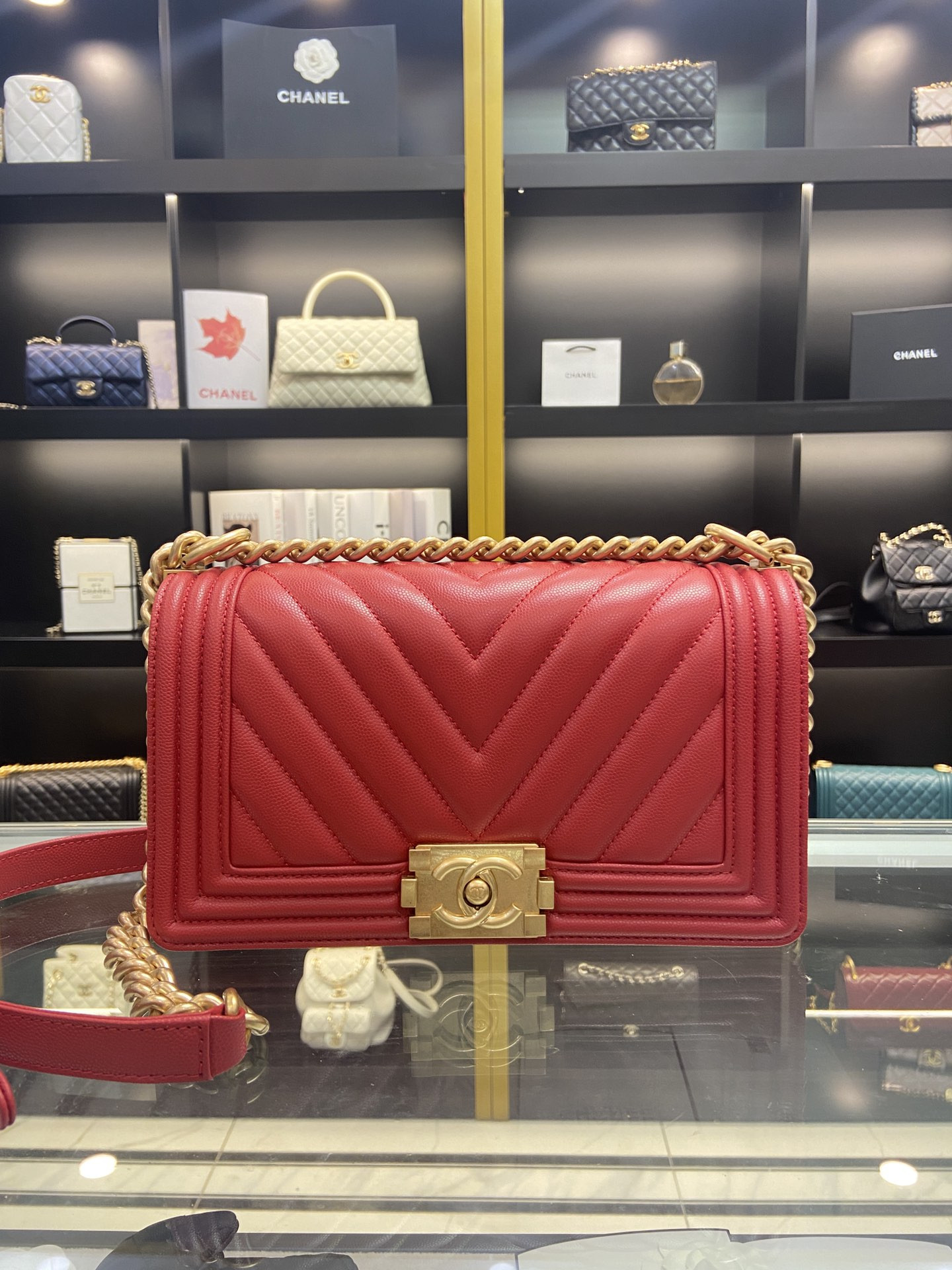 boy Ch*el handbag shiny red grained calfskin & gold-tone metal 5.9 × 9.8 × 3.5 in