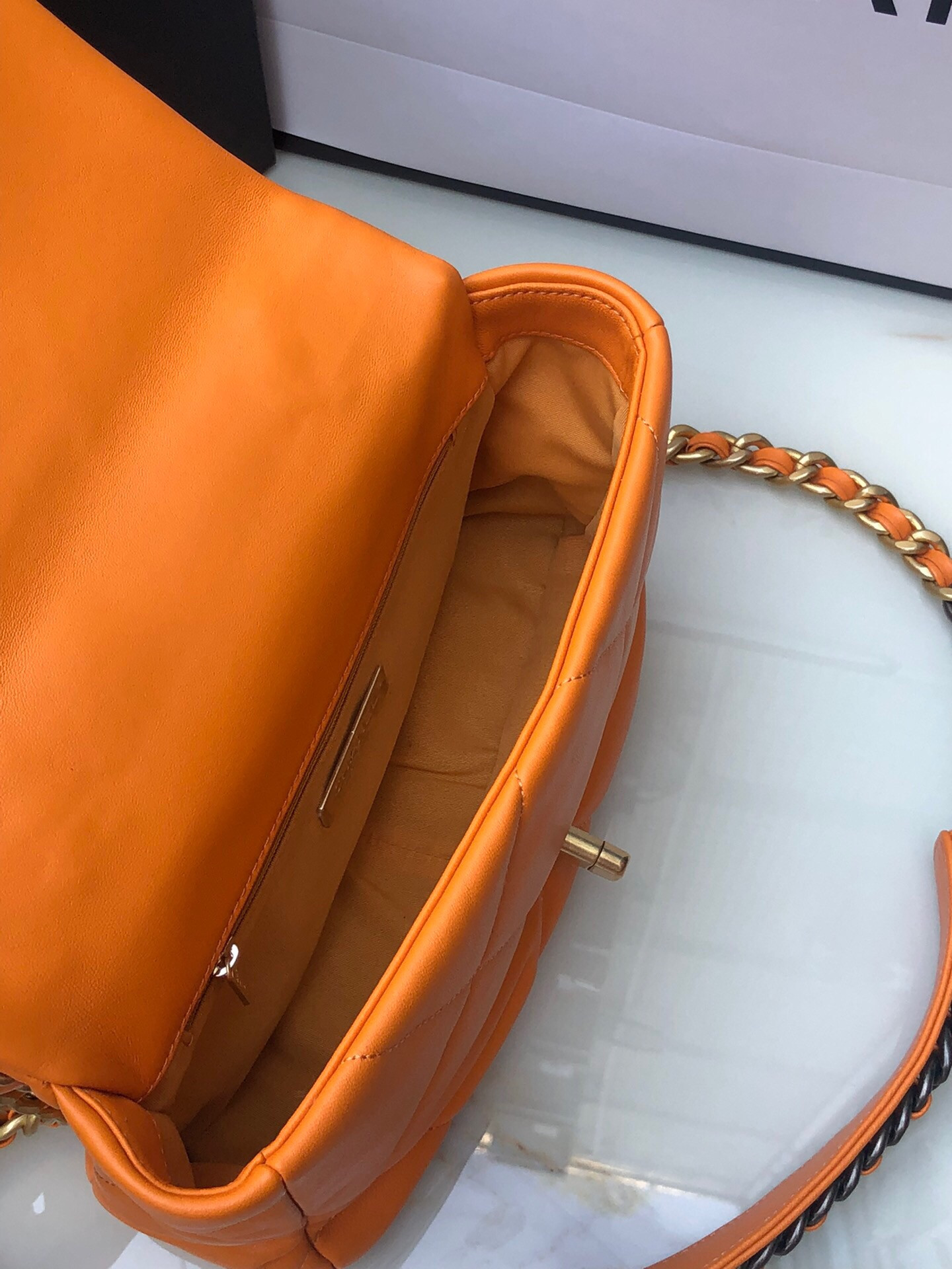 Ch*el 19 handbag shiny leather, gold-tone, silver-tone & ruthenium-finish metal orange 6.2 × 10.1 × 3.5 in