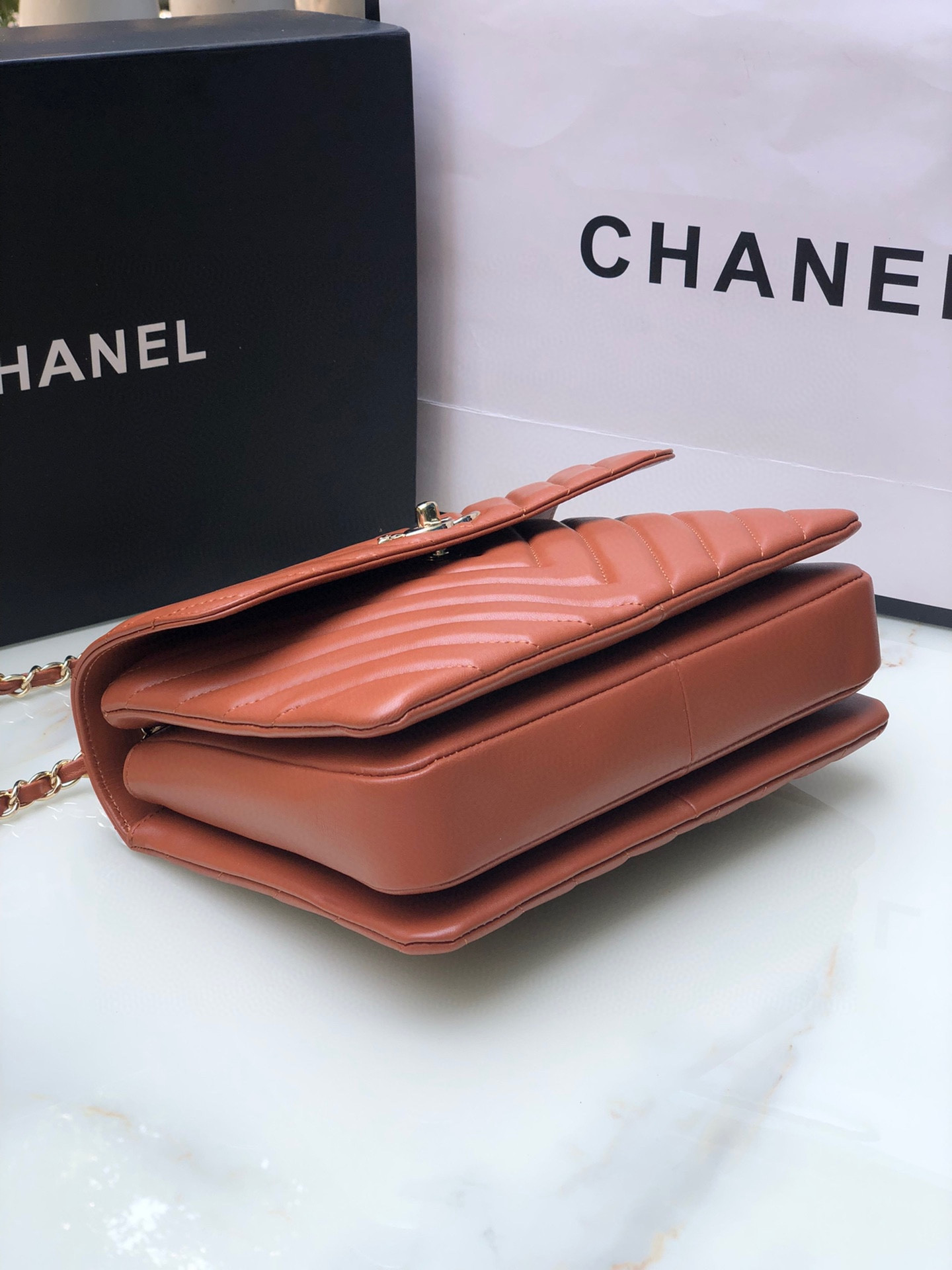 Ch*el flap bag with top handle orange 6.6 × 9.8 × 4.7 in