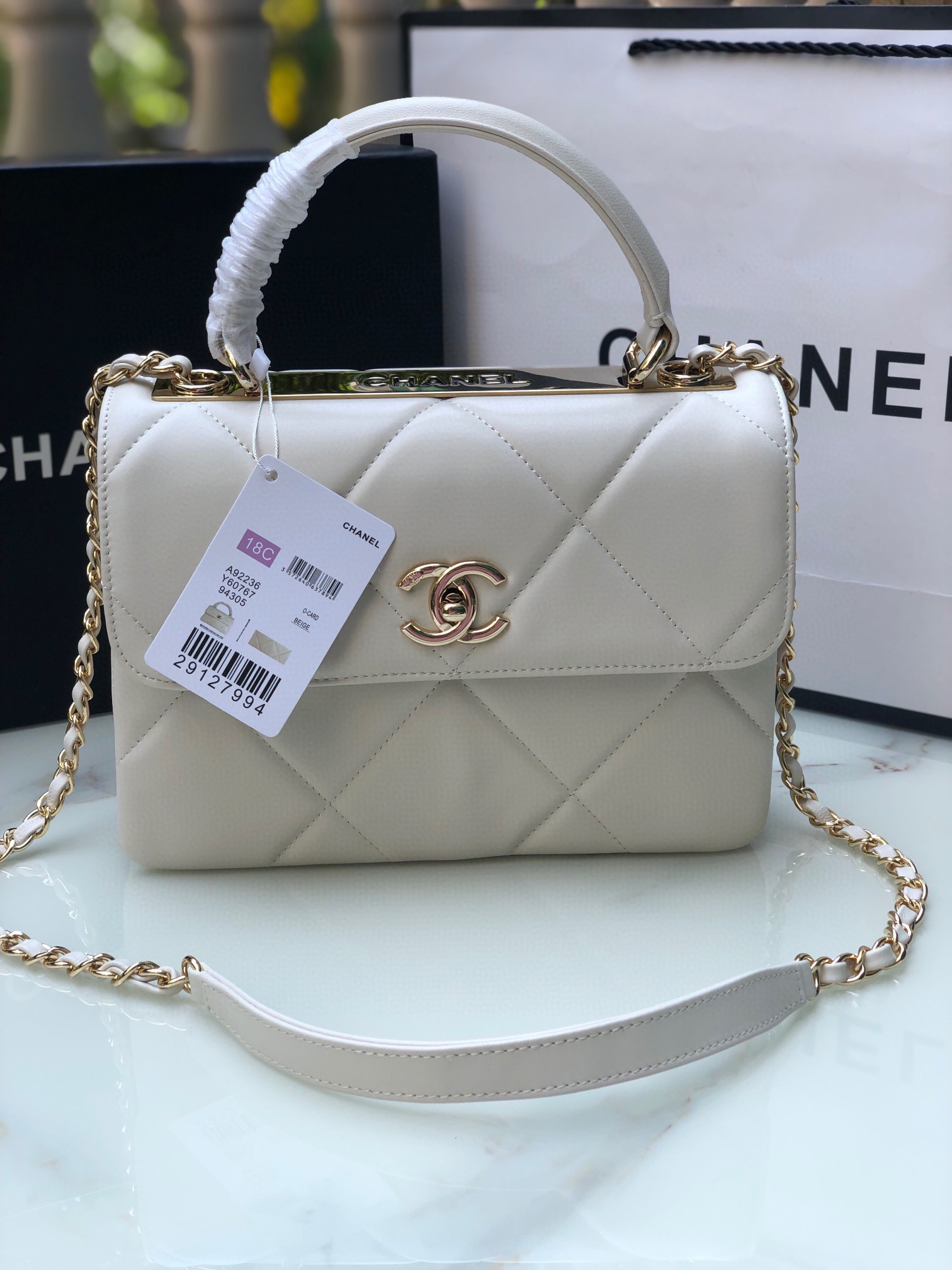 Ch*el flap bag with top handle 6.6 × 9.8 × 4.7 in