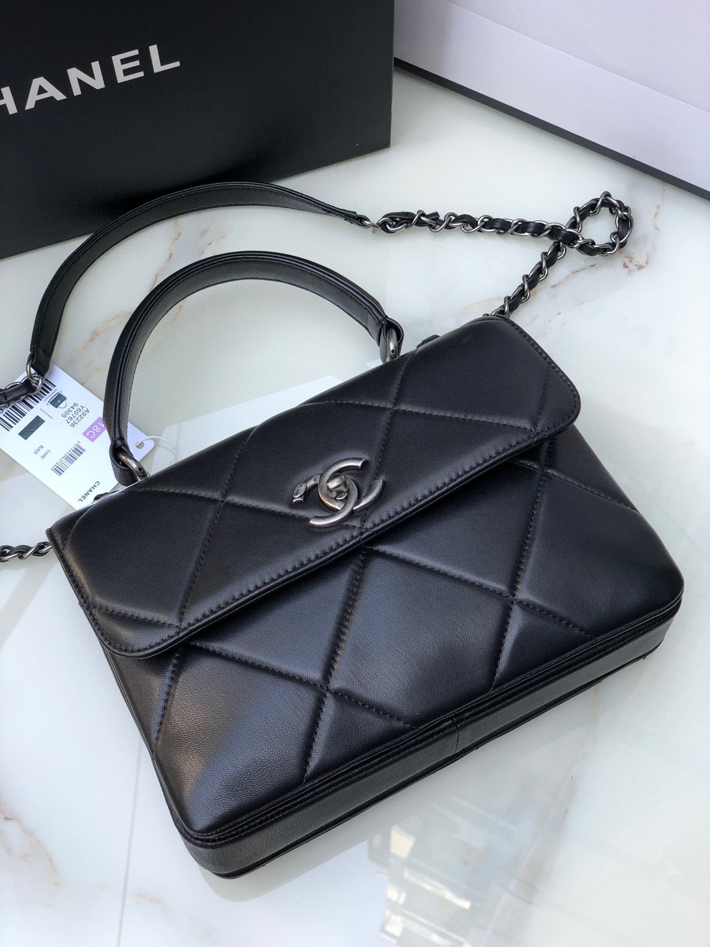 Ch*el flap bag with top handle 6.6 × 9.8 × 4.7 in