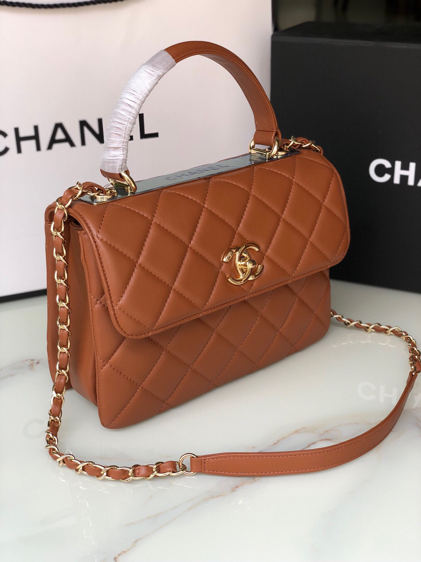 Ch*el flap bag with top handle 6.6 × 9.8 × 4.7 in
