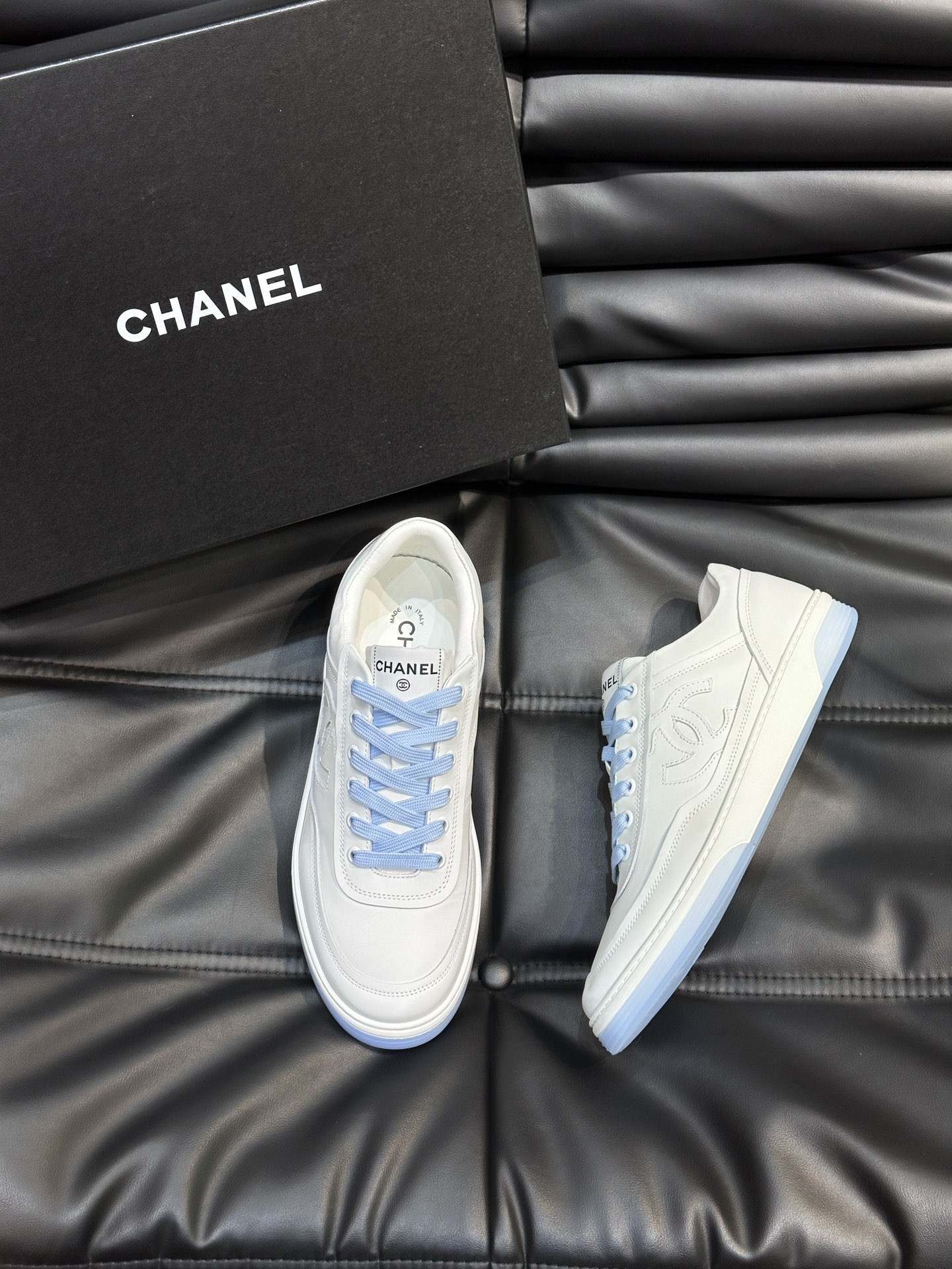 ua Ch*el sneaker calfskin