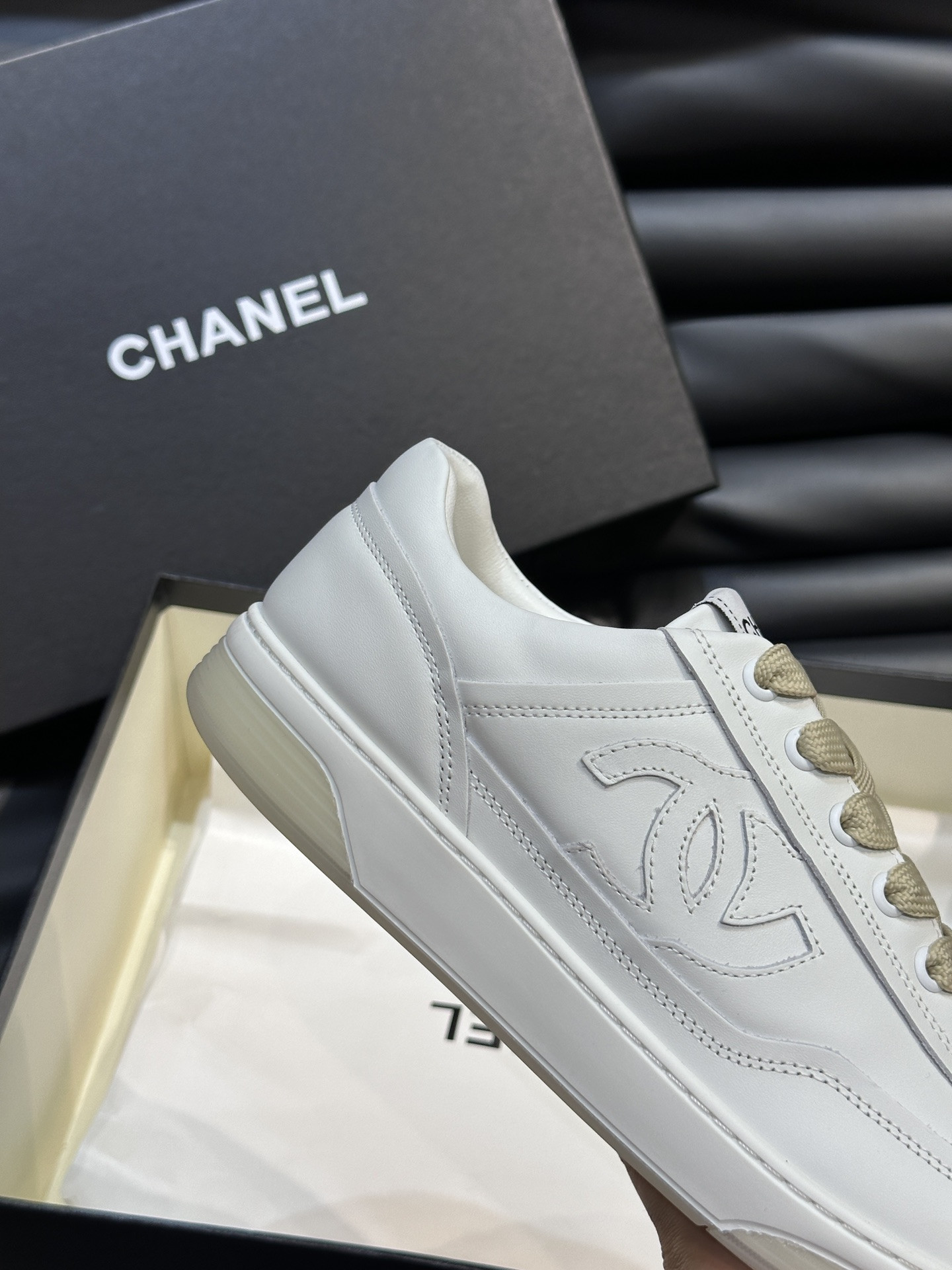 ua Ch*el sneaker calfskin